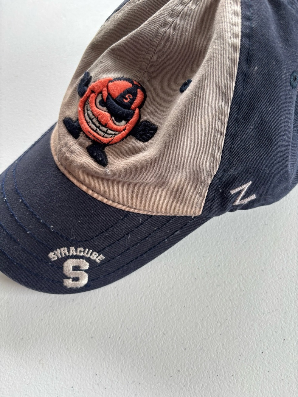 Zephyr Two-Tone Syracuse Hat - Navy & Tan with Orange Logo